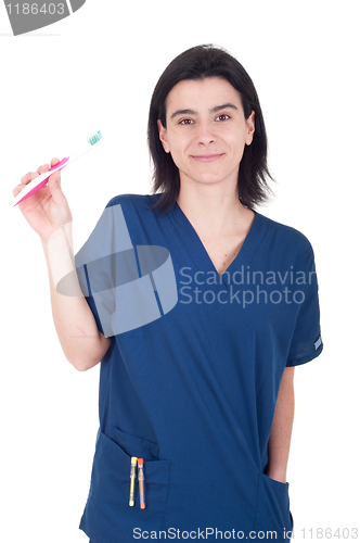 Image of Dentist holding toothbrush