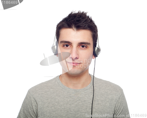 Image of Casual man listening music