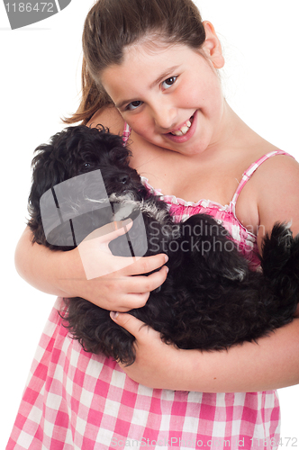 Image of Girl holding dog