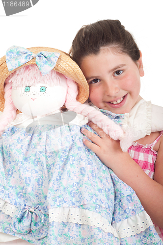 Image of Little girl with doll