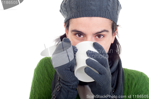 Image of Winter woman having coffee