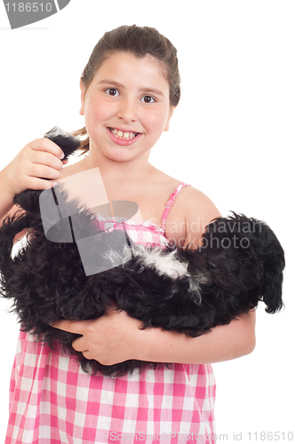 Image of Girl playing with dog
