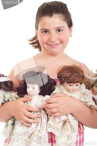 Image of Little girl with dolls