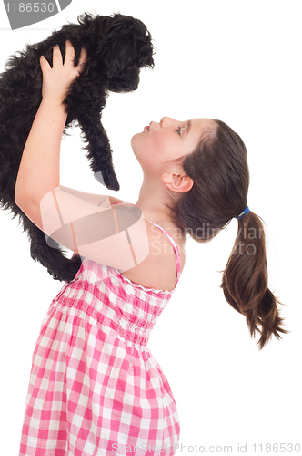 Image of Girl kissing dog