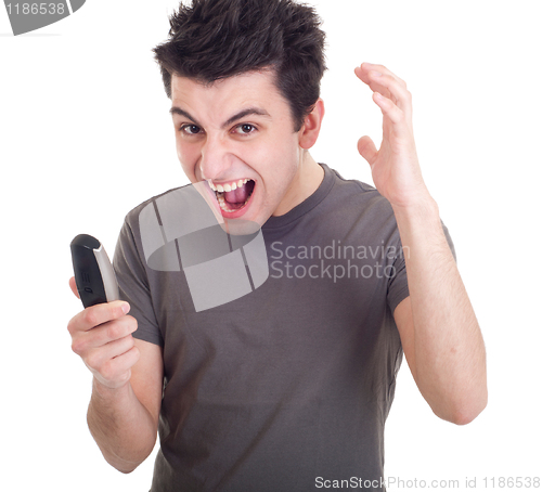 Image of Man yelling into mobile