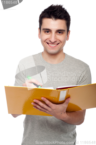 Image of Man studying with dossier