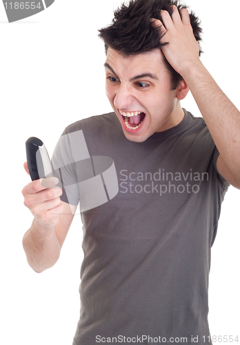 Image of Man yelling into mobile