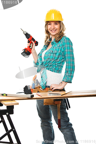 Image of smiling woman carpenter