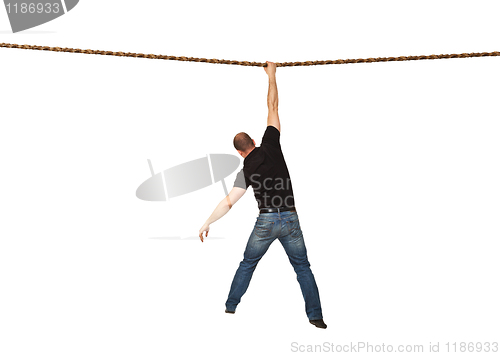 Image of man on rope