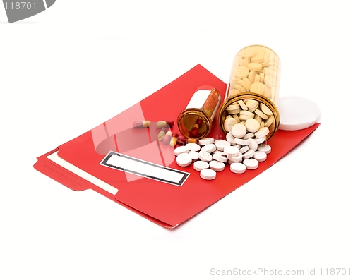 Image of medical folder & pills