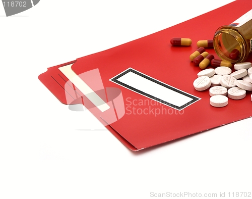 Image of medical folder & pills