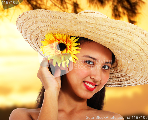 Image of Pretty Girl In A Hat At Sunset