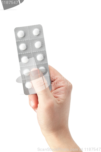 Image of pills in a hand