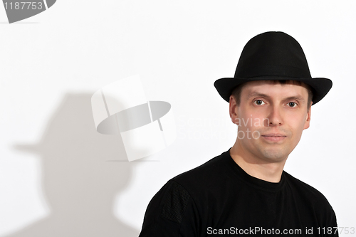 Image of man in a black hat