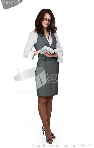Image of girl with glasses reading a book