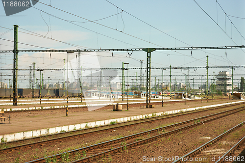 Image of Old train station with rails and cables