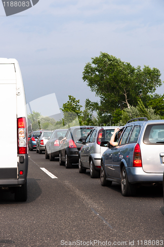 Image of Traffic jam with trees in the background