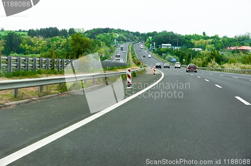 Image of Hoghway with cars and trees