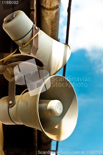 Image of Loudspeakers against blue sky