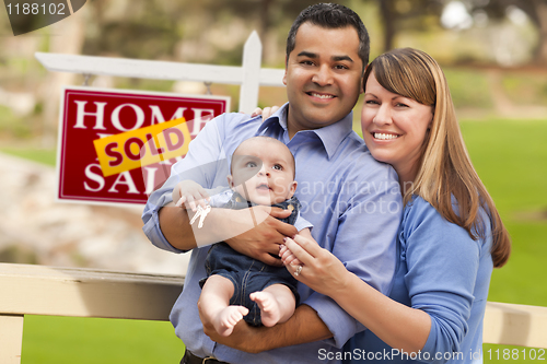 Image of Mixed Race Couple, Baby, Sold Real Estate Sign