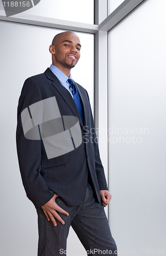 Image of Business man beside the window