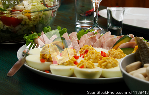 Image of eggs and pork on table