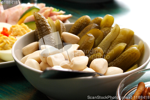 Image of garlic and cucumber on the table