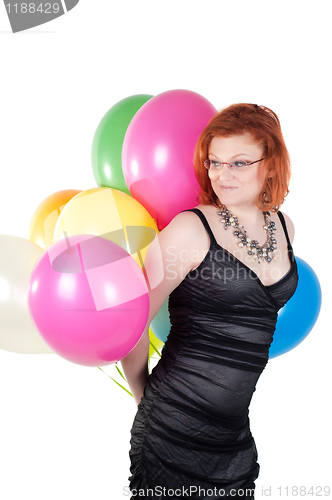 Image of Beautiful woman with multicolored air balloons