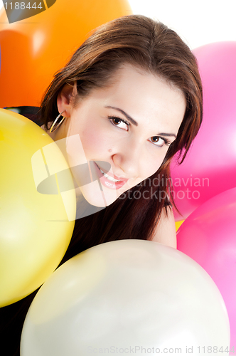 Image of Beautiful woman with multicolored air balloons