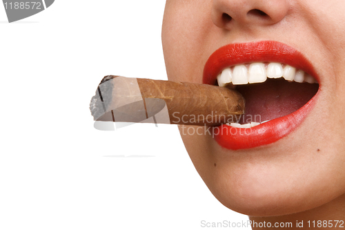 Image of mouth with red lips biting a cigar