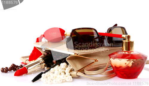 Image of open bag with female cosmetic snd accessories