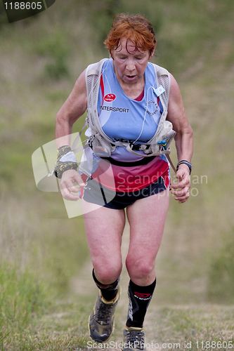 Image of Tired senior runner