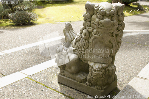 Image of Japanese Stone Guardian Lion with Cub Sculpture