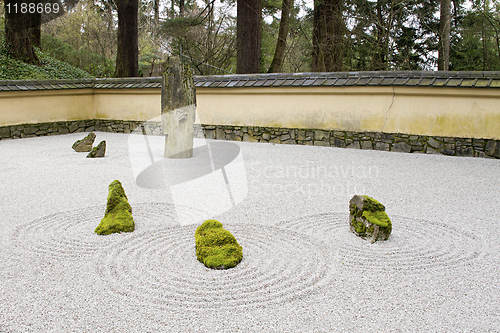 Image of Japanese Stone and Sand Garden with Tiled Roof Wall
