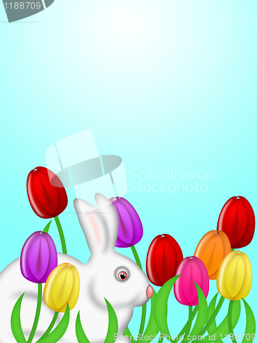 Image of White Easter Bunny Amongst Colorful Tulips