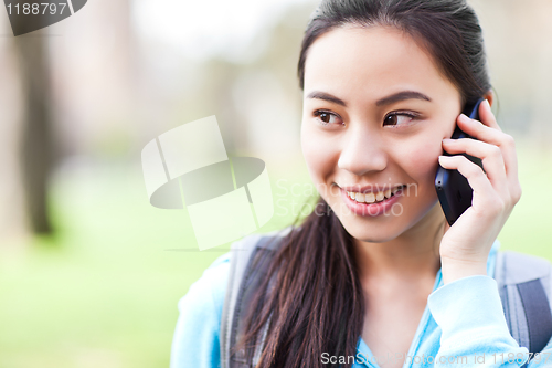 Image of Asian student on the phone