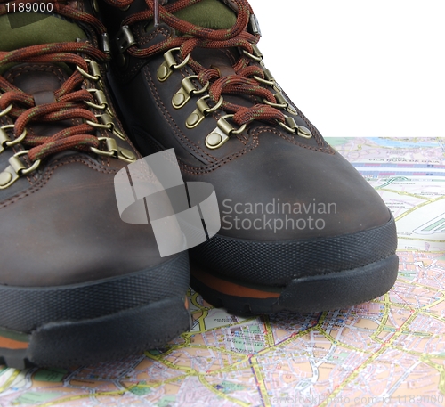 Image of Hiking boots and map