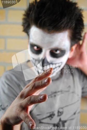 Image of Evil look and hand (Carnival portrait)