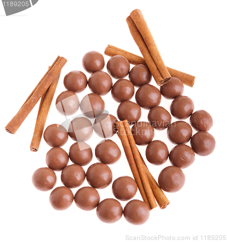 Image of Chocolate balls and cinnamon sticks