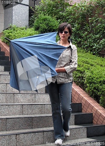 Image of Woman with umbrella