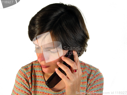 Image of Girl listening the mobile phone