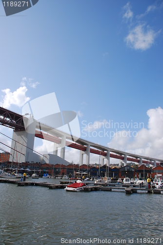 Image of Lisbon's docks under April 25th bridge