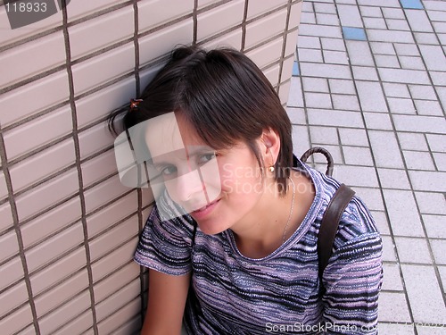 Image of Smiling girl looking up