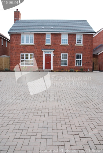 Image of Detached red brick house