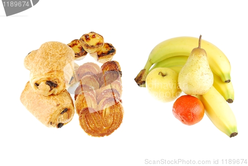 Image of Healthy vs unhealthy (baked goods and fruits on white)