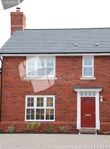 Image of Detached red brick house