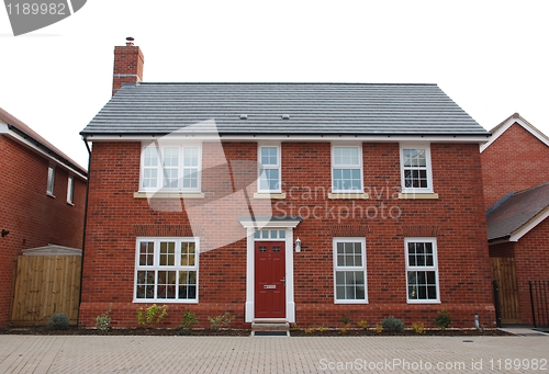 Image of Detached red brick house