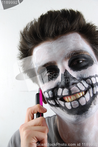 Image of Skeleton guy talking on mobile phone