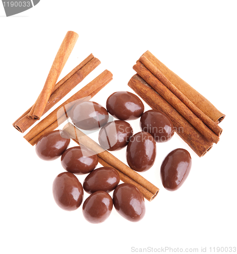 Image of Chocolate almonds and cinnamon sticks