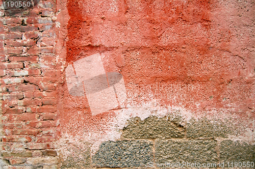 Image of weathered red wall